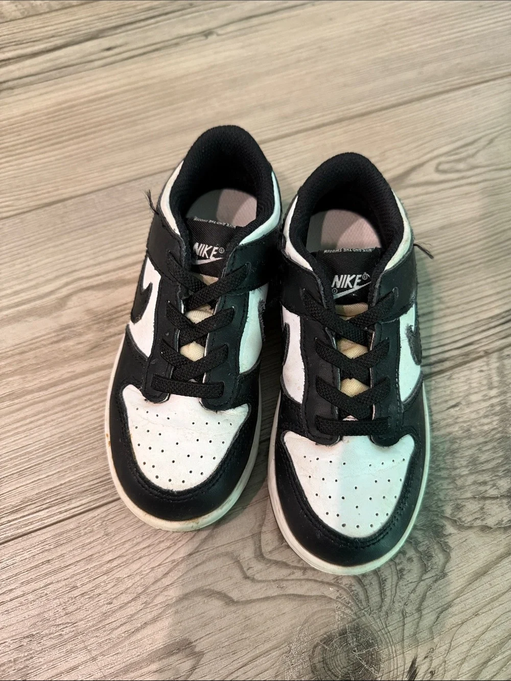 Nike Kids Black and White Low-Top Sneakers with Swoosh